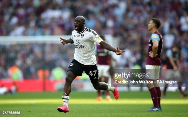 Fulham's Aboubakar Kamara celebrates promotion after the final whistle during the Sky Bet Championship Final at Wembley Stadium, London.
