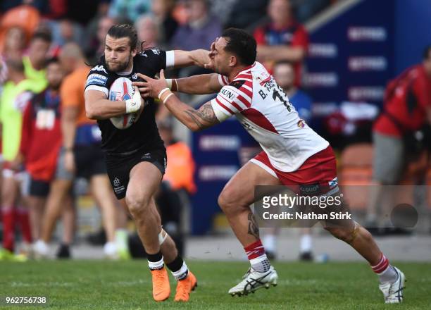 Liam Kay of Toronto Wolfpack and Bodene Thompson of Leigh Centurions in action during the Rugby League 2018 Summer Bash match between Toronto...
