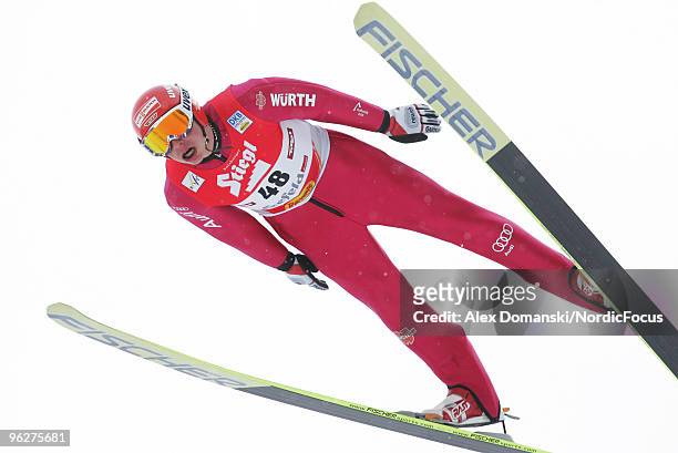Eric Frenzel of Germany competes in the Gundersen Ski Jumping HS 100 event during day one of the FIS Nordic Combined World Cup on January 30, 2010 in...