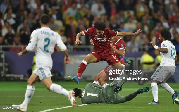 Mohamed Salah of Liverpool with Kiko Casilla of Real Madrid during the UEFA Champions League final between Real Madrid and Liverpool on May 26, 2018...