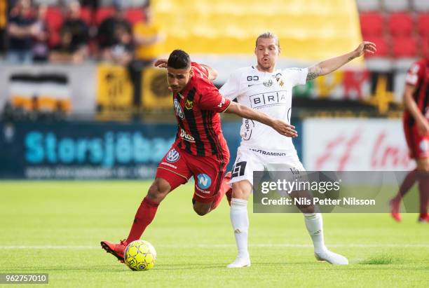 Hosam Aiesh of Ostersunds FK and Karl Bohm of BK Hacken competes for the ball during the Allsvenskan match between Ostersunds FK and BK Hacken at...