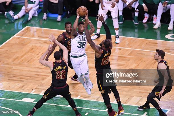 Marcus Smart of the Boston Celtics passes the ball against LeBron James of the Cleveland Cavaliers during Game Five of the 2018 NBA Eastern...