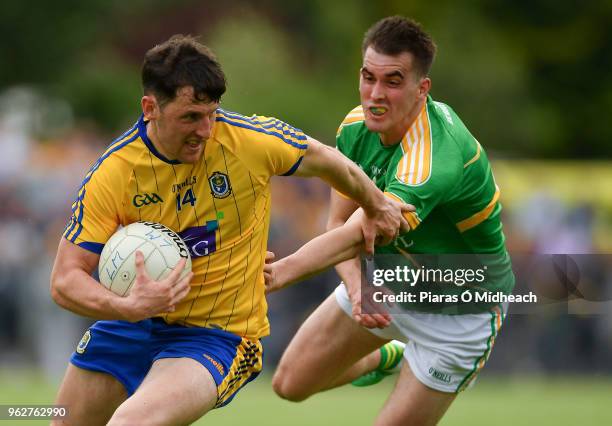 Leitrim , Ireland - 26 May 2018; Diarmuid Murtagh of Roscommon in action against Paddy Maguire of Leitrim during the Connacht GAA Football Senior...