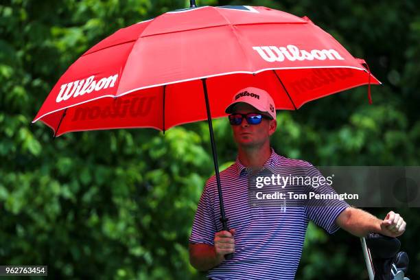 Kevin Streelman looks on before playing his shot on the eighth tee during round three of the Fort Worth Invitational at Colonial Country Club on May...