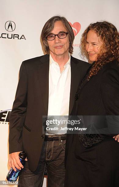 Musician Jackson Browne and Dianna Cohen arrive at the 2010 MusiCares Person Of The Year Tribute To Neil Young at Los Angeles Convention Center on...