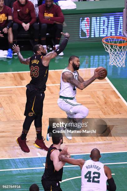 Marcus Morris of the Boston Celtics lays up a shot against LeBron James of the Cleveland Cavaliers during Game Five of the 2018 NBA Eastern...