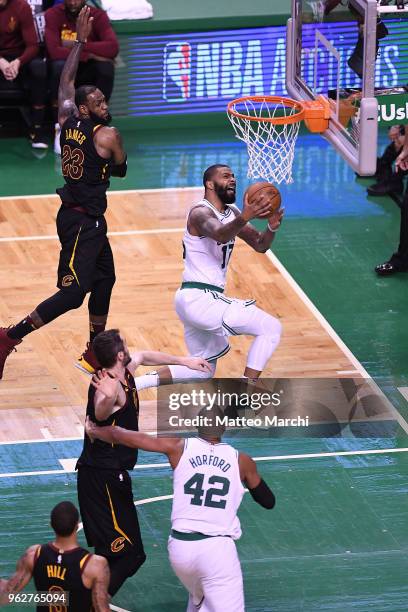 Marcus Morris of the Boston Celtics lays up a shot against LeBron James of the Cleveland Cavaliers during Game Five of the 2018 NBA Eastern...