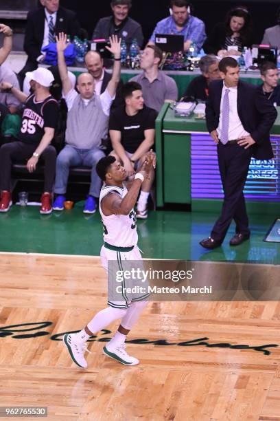 Marcus Smart and Head Coach Brad Stevens of the Boston Celtics react during the game against of the Cleveland Cavaliers on Game Five of the 2018 NBA...