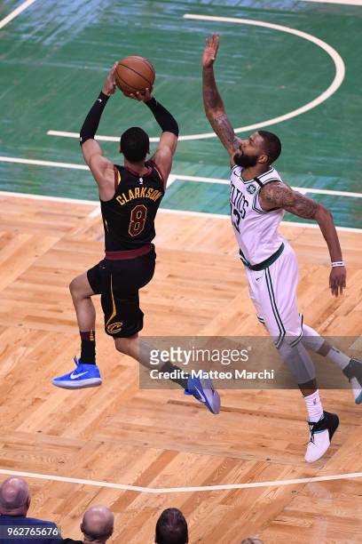 Jordan Clarkson of the Cleveland Cavaliers shoots the ball against Marcus Morris of the Boston Celtics during Game Five of the 2018 NBA Eastern...