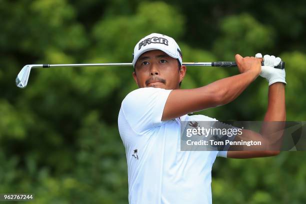 Satoshi Kodaira of Japan plays his shot from the eighth tee during round three of the Fort Worth Invitational at Colonial Country Club on May 26,...