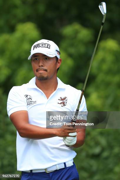 Satoshi Kodaira of Japan plays his shot from the eighth tee during round three of the Fort Worth Invitational at Colonial Country Club on May 26,...