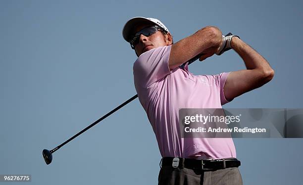 Brett Rumford of Australia hits his tee-shot on the seventh hole during the third round of the Commercialbank Qatar Masters at Doha Golf Club on...