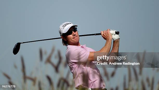 Brett Rumford of Australia hits his tee-shot on the ninth hole during the third round of the Commercialbank Qatar Masters at Doha Golf Club on...