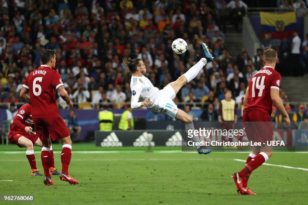 Gareth Bale of Real Madrid shoots and scores his side's second goal during the UEFA Champions League Final between Real Madrid and Liverpool at NSC...