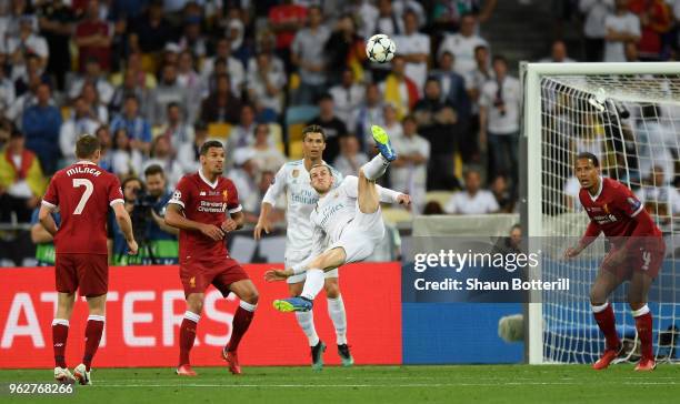 Gareth Bale of Real Madrid scores his sides second goal during the UEFA Champions League Final between Real Madrid and Liverpool at NSC Olimpiyskiy...