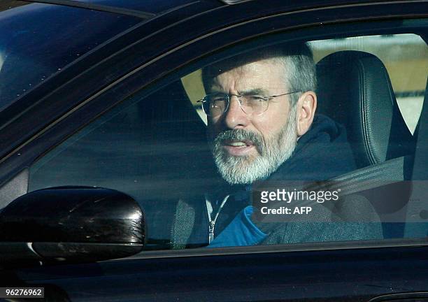 Sinn Fein President Gerry Adams enters the front gates of Hillsborough Castle in Hillsborough, Northern Ireland, on January 30, 2010. The British and...