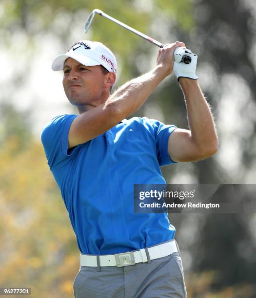 Niclas Fasth of Sweden watches his tee-shot on the third hole during the third round of the Commercialbank Qatar Masters at Doha Golf Club on January...