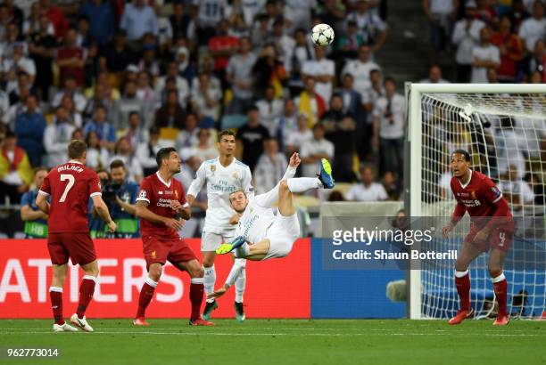 Gareth Bale of Real Madrid scores his sides second goal during the UEFA Champions League Final between Real Madrid and Liverpool at NSC Olimpiyskiy...