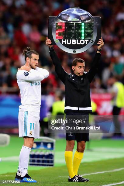 Gareth Bale of Real Madrid prepares to come on as a substitute during the UEFA Champions League final between Real Madrid and Liverpool at NSC...