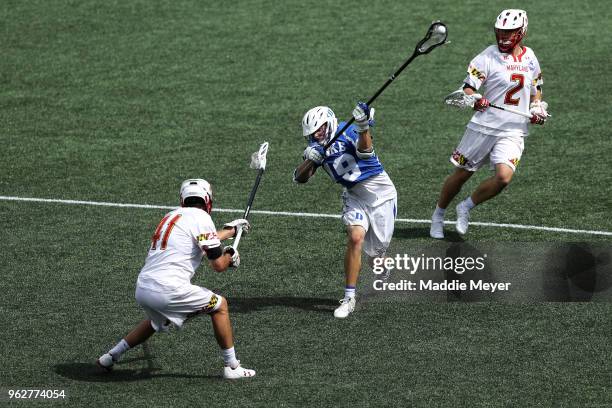 Greg Pelton of Duke takes a shot against Bryce Young of Maryland during the 2018 NCAA Division I Men's Lacrosse Championship Semifinals at Gillette...