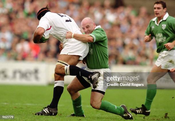 Keith Wood of Ireland tackles Danny Grewcock of England during the Lloyds TSB Six Nations Championship match played at Lansdowne Road, in Dublin,...