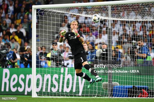 Loris Karius of Liverpool fumbles the ball as he concedes for the third time during the UEFA Champions League Final between Real Madrid and Liverpool...