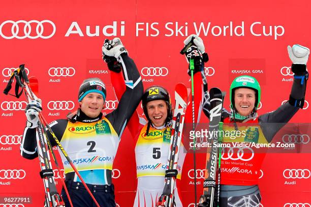 Marcel Hirscher of Austria takes 1st place, Kjetil Jansrud of Norway takes 2nd place, and Ted Ligety of USA takes 3rd place during the Audi FIS...