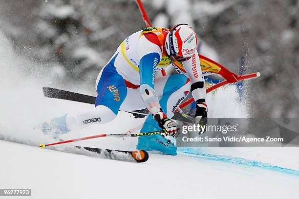 Didier Defago of Switzerland falls during the Audi FIS Alpine Ski World Cup Men's Giant Slalom on January 30, 2010 in Kranjska Gora, Slovenia.