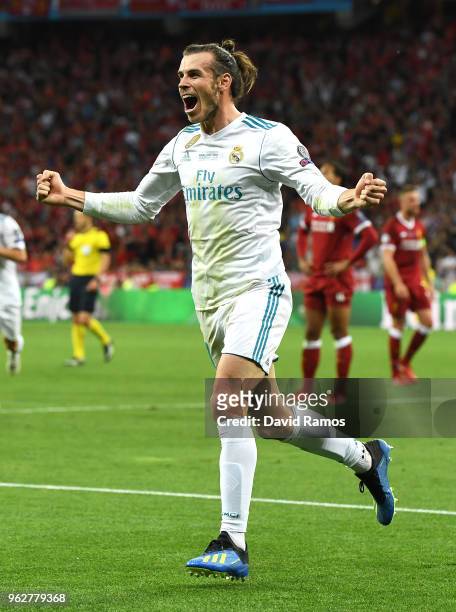 Gareth Bale of Real Madrid celebrates scoring his sides third goal, his second, during the UEFA Champions League Final between Real Madrid and...