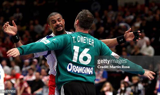 Didier Dinart of France celebrates with team mate Thierry Omeyer during the Men's Handball European semi final match between Iceland and France at...