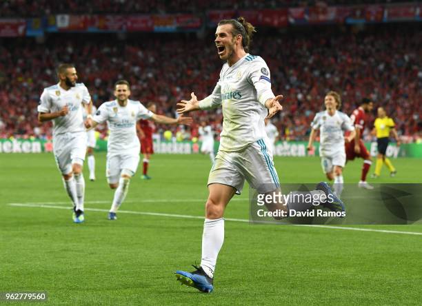 Gareth Bale of Real Madrid celebrates scoring his sides third goal, his second, during the UEFA Champions League Final between Real Madrid and...