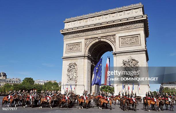 French Republican Guards stand at the Arc de Triomphe during the ceremony of the Bastille Day, on July 14, 2008 in Paris. France kicked off Bastille...