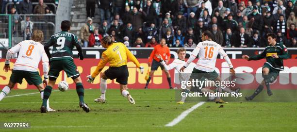 Raul Bobadilla of Moenchengladbach scores his teams third goal against Tim Wiese of Bremen during the Bundesliga match between Borussia...