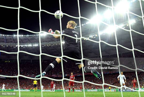 Loris Karius of Liverpool fumbles the ball as he concedes for the third time and for Real Madrid third goal of the game during the UEFA Champions...