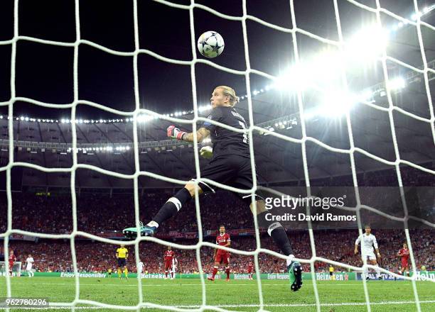 Loris Karius of Liverpool fumbles the ball as he concedes for the third time and for Real Madrid third goal of the game during the UEFA Champions...