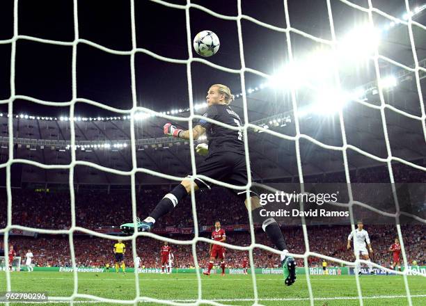 Loris Karius of Liverpool fumbles the ball as he concedes for the third time and for Real Madrid third goal of the game during the UEFA Champions...