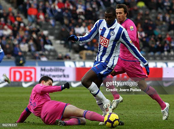 Adrian Ramos of Berlin and Marcel Maltritz and Christoph Dabrowski of Bochum battle for the ball during the Bundesliga match between Hertha BSC...
