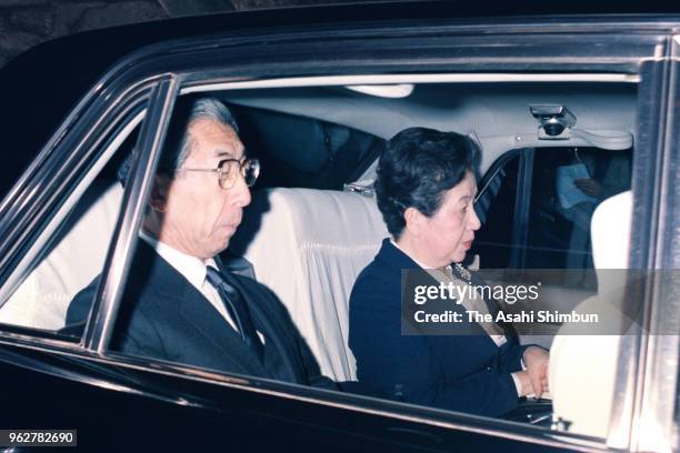 Prince Mikasa and Princess Yuriko of Mikasa are seen on departure for the Imperial Palace as Emperor Hirohito in critical condition at the Togu...