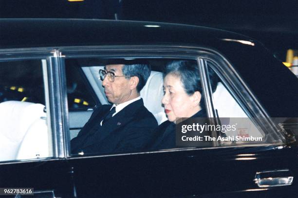 Prince Mikasa and Princess Yuriko of Mikasa are seen after attending the 'Shiko-no-Gi', vigil after Emperor Hirohito died of cancer at the Imperial...