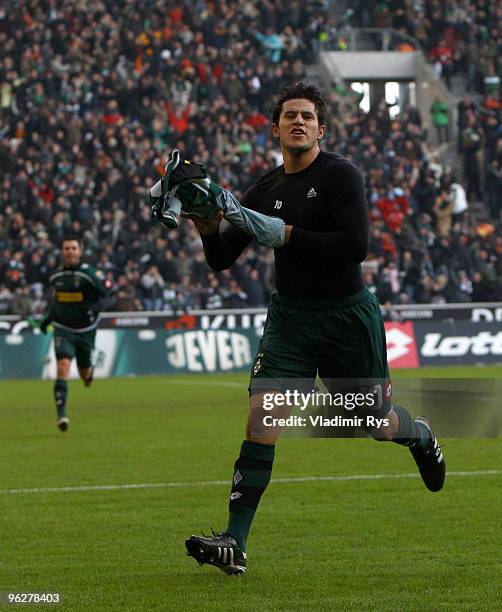 Raul Bobadilla of Moenchengladbach celebrates after scoring his team's fourth goal during the Bundesliga match between Borussia Moenchengladbach and...