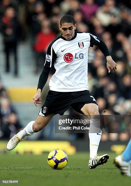 Chris Smalling of Fulham passes the ball during the Barclays Premier League match between Fulham and Aston Villa at Craven Cottage on January 30,...