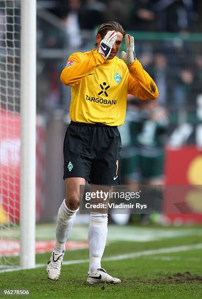 Tim Wiese of Bremen reacts after conceding the third goal scored by Raul Bobadilla of Moenchengladbach during the Bundesliga match between Borussia...