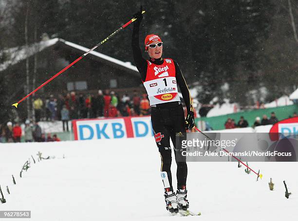 Eric Frenzel of Germany celebrates after winning the Gundersen 10km Cross Country event during day one of the FIS Nordic Combined World Cup on...