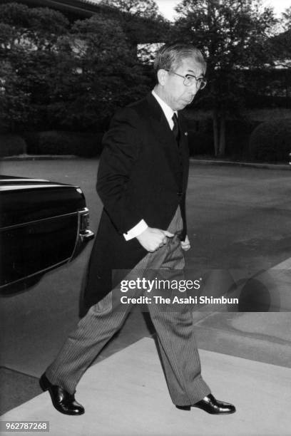 Prince Mikasa is seen on arrival to attend the 'Kenji to Keisho no Gi', ascending ceremony of the new emperor after Emperor Hirohito died of cancer...