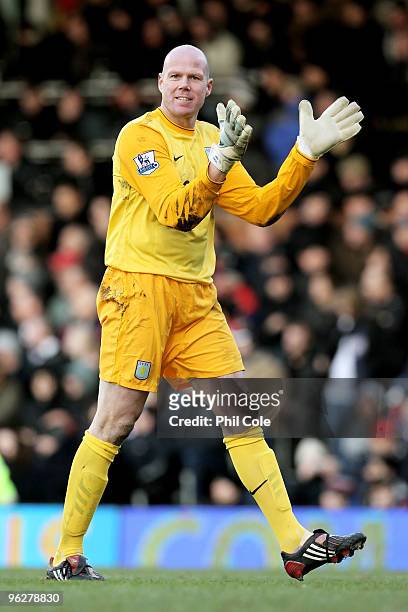Brad Friedel of Aston Villa celebrates after teammate Gabriel Agbonlahor scores their team's second goal during the Barclays Premier League match...