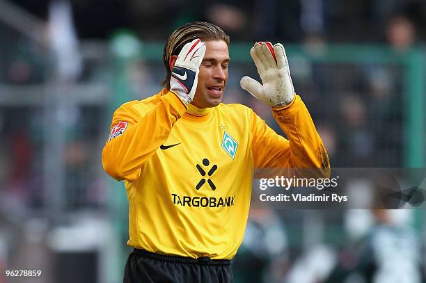 Tim Wiese of Bremen reacts after conceding the third goal scored by Raul Bobadilla of Moenchengladbach during the Bundesliga match between Borussia...