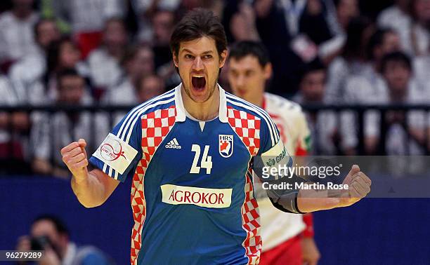 Tonci Valcic of Croatia celebrates after the Men's Handball European semi final match between Croatia and Poland at the Stadthalle on January 30,...