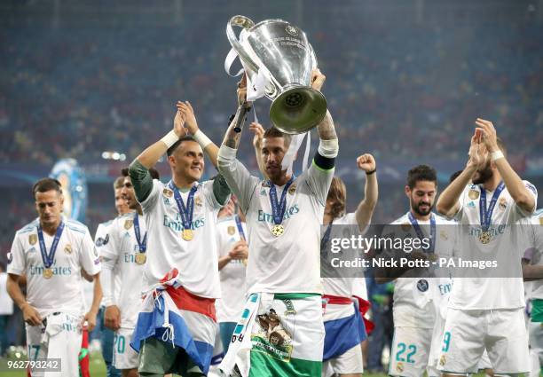 Real Madrid's Garcia Sergio Ramos celebrates with the trophy after winning the UEFA Champions League Final at the NSK Olimpiyskiy Stadium, Kiev.