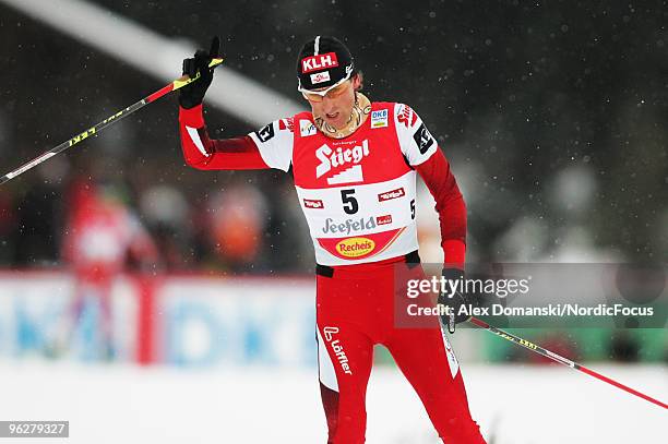 Mario Stecher of Austria celebrates after taking second place in the Gundersen Ski Jumping HS 100/10km Cross Country event during day one of the FIS...