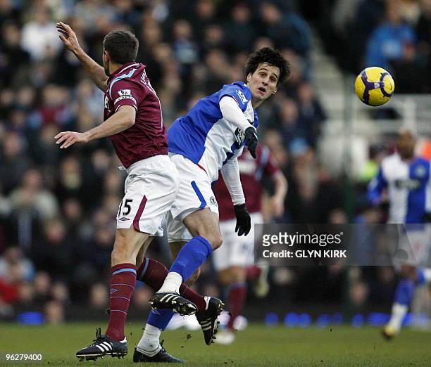 West Ham's English defender Matthew Upson vies with Blackburn's Croatian striker Nikola Kalinic during the English Premier League football match...